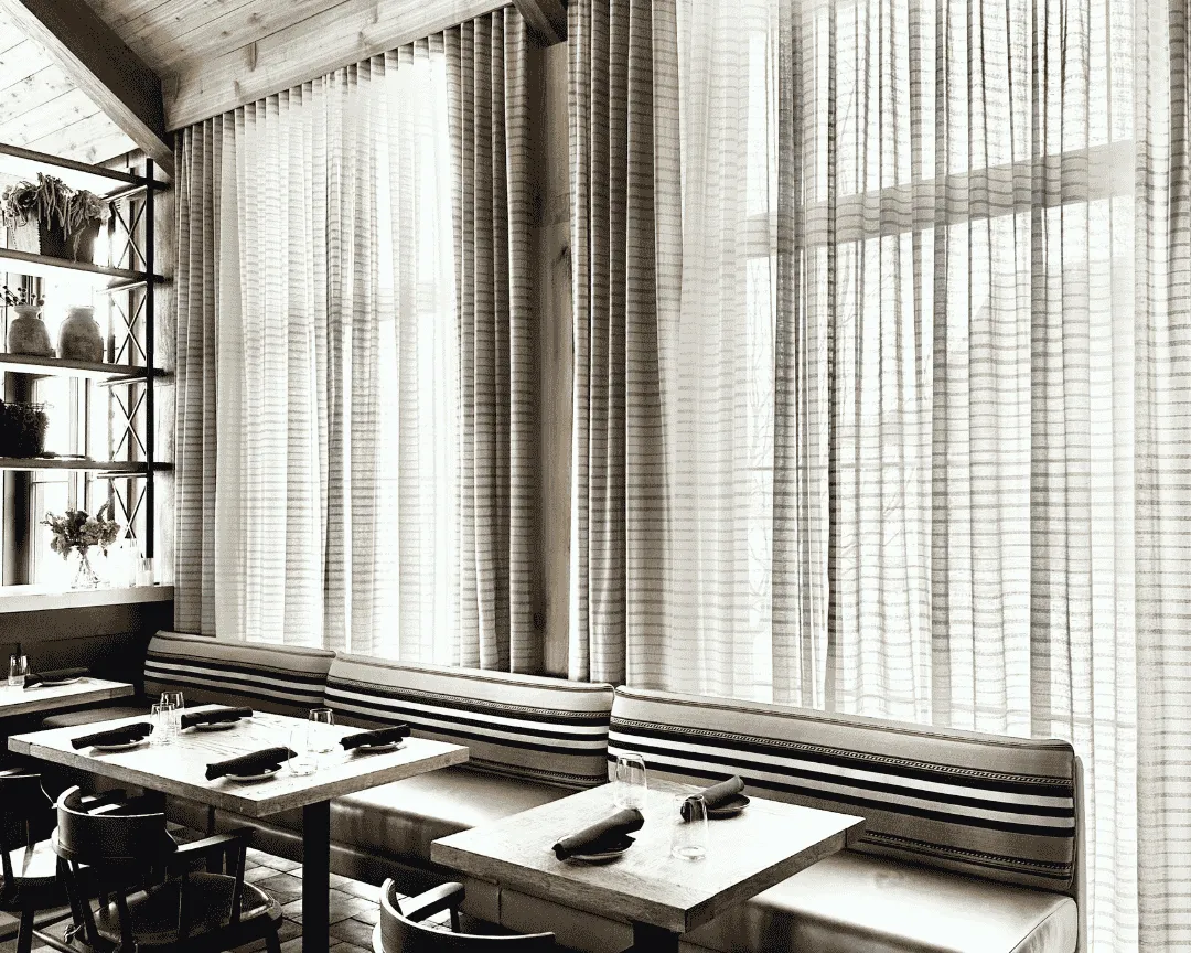 Window treatments installation in a restaurant
